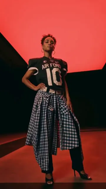 Fashion portrait against a vivid red studio background